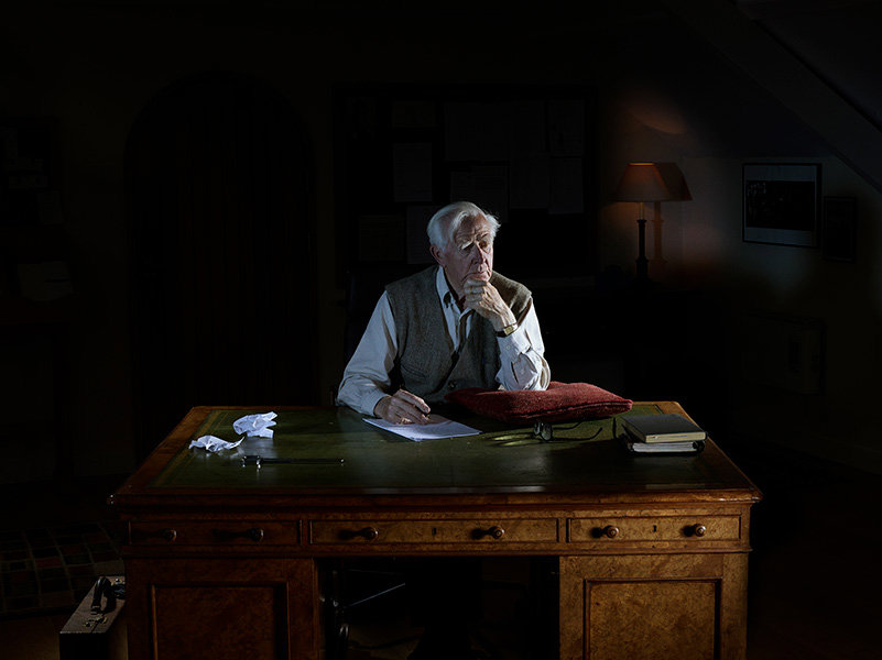 John Le Carré thinking at desk